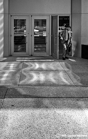 Man and Building Entrance