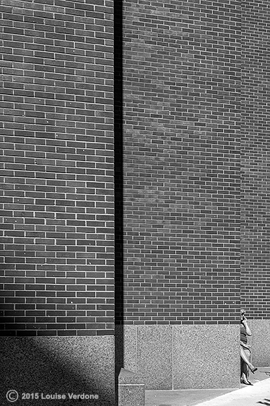 Seated Woman Around a Building