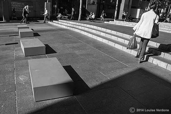 Rectangles and Woman on a Plaza