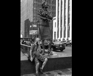 Man and Woman with Poodle Sculpture