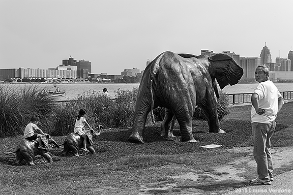 Elephant sculpture and children