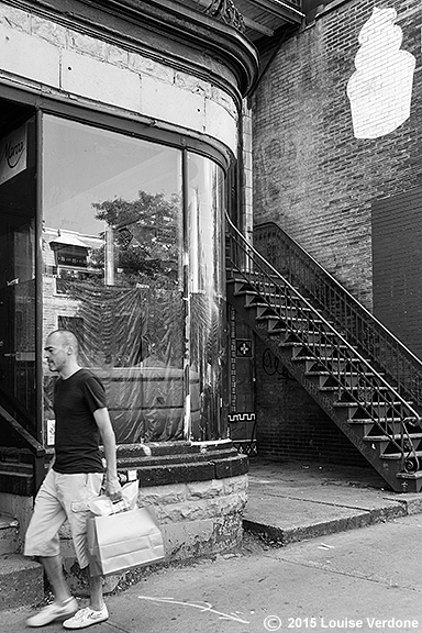 Man With Bag and Cupcake