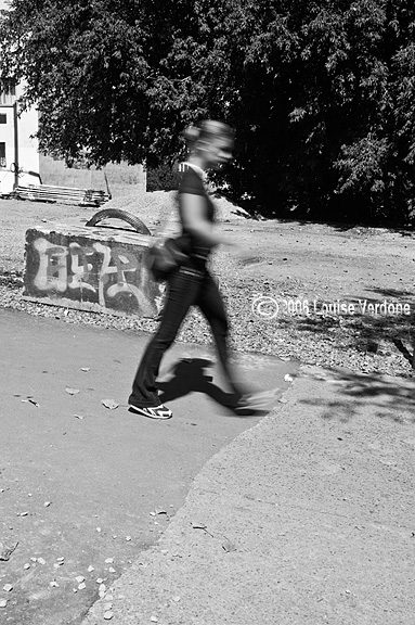 Blurred Woman and Graffiti Block