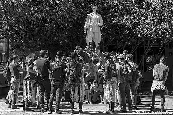 Crowd Below a Sculpture