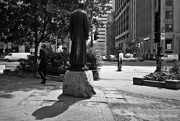 People Around Sculpture