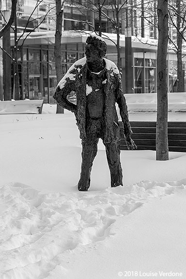 Steps Near a Sculpture in the Snow