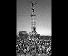 Crowd Around a Sculpture