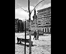 Couple Around a Sculpture