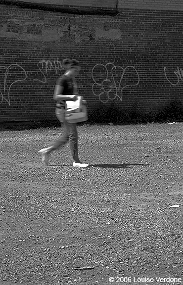 Blurred Woman in Vacant Lot