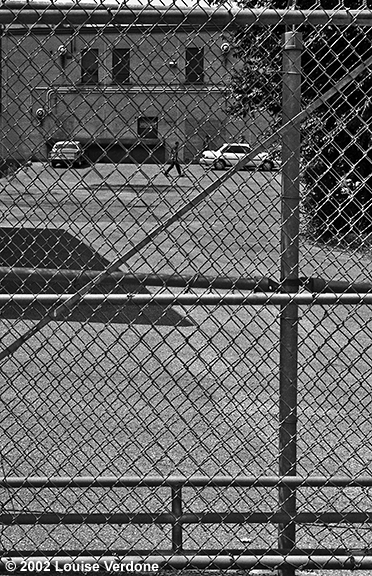 Caged Man in Parking