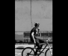 Blurred Cyclist with Hair Bun