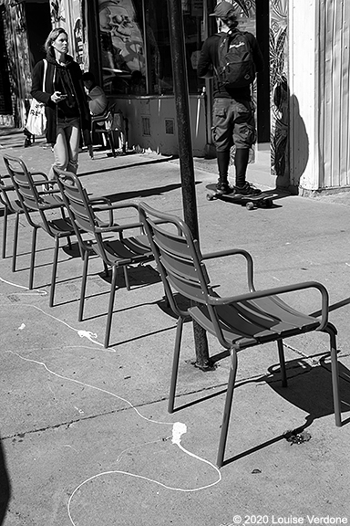 Chairs and Skateboarder