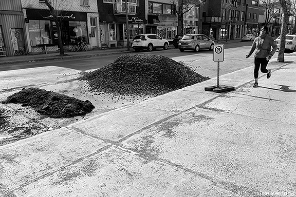 Jogging Near Gravel Piles