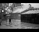 Woman Around a Building and Smoke